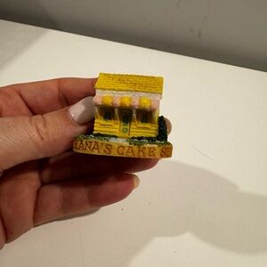 TINA'S CAKE SHOP" from "Mini-Vilage" series,  by Lyons Tetley Ltd. in 1995.